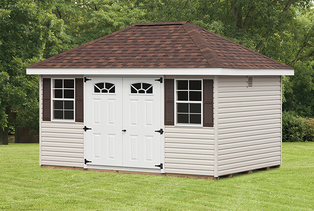 10'x14' Hip Barn with 5 Lite Arched Windows, Double Doors and 24”x36” Windows and Shingles over Ridge Vent